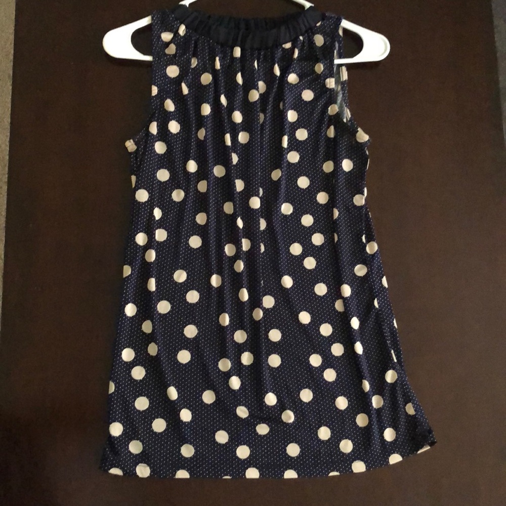 Sleeveless dress shirt. The limited